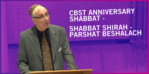 CBST President Ivan Zimmerman stands against the background of the CBST sanctuary, with the words beside him "CBST Anniversary Shabbat - Shabbat Shirah - Shabbat Beshalach"