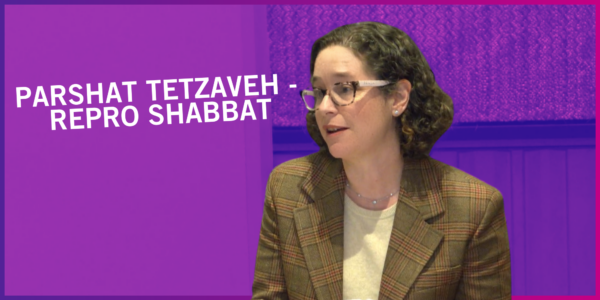 Guest Speaker Elise Keppler speaks from the bimah, with the sanctuary behind her washed in pink and purple. Beside her are the words "Parashat Tetzaveh - Repro Shabbat"